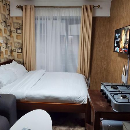 Lovely & Cozy Compact Studio Near Airport With Rooftop View Apartment Найроби Екстериор снимка