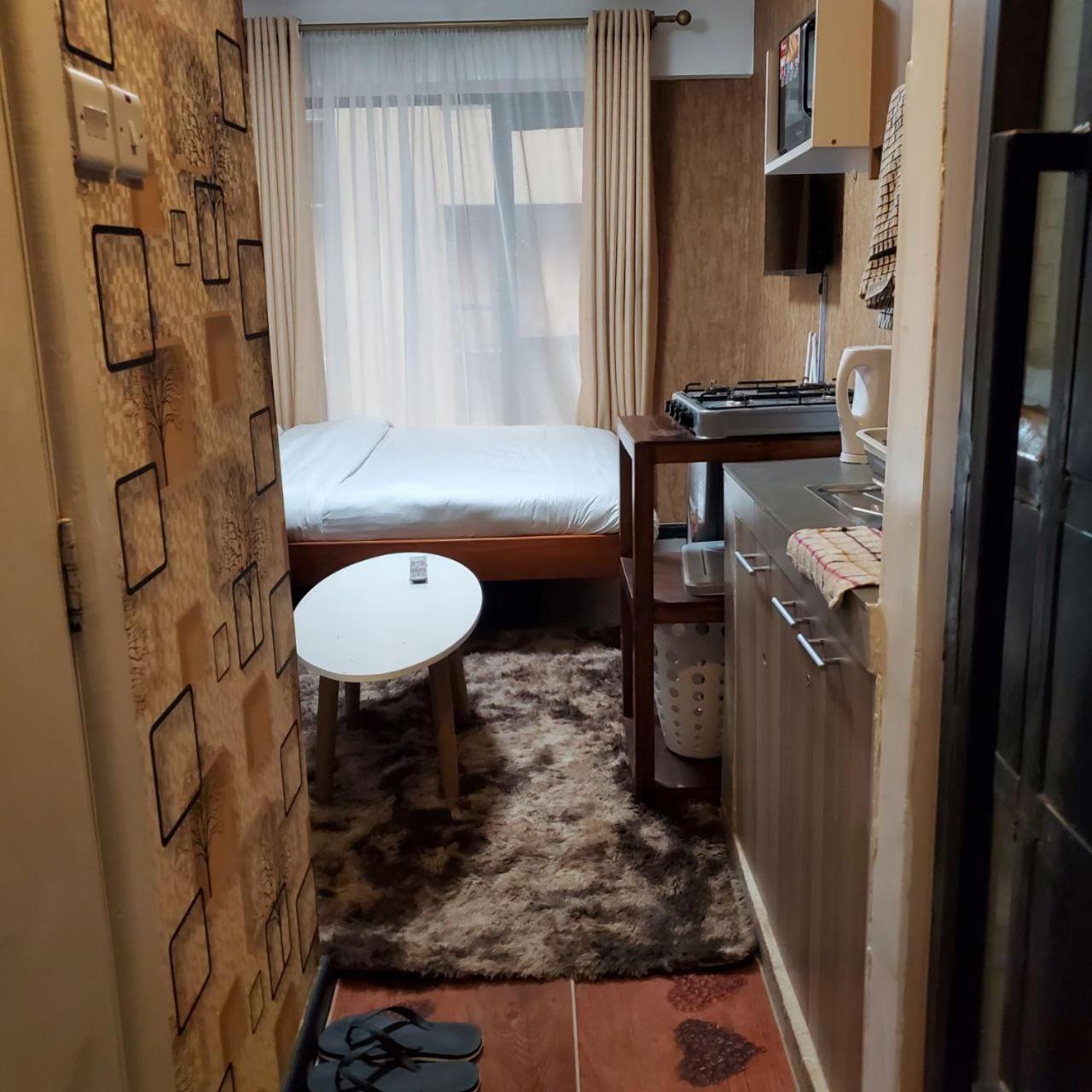Lovely & Cozy Compact Studio Near Airport With Rooftop View Apartment Найроби Екстериор снимка