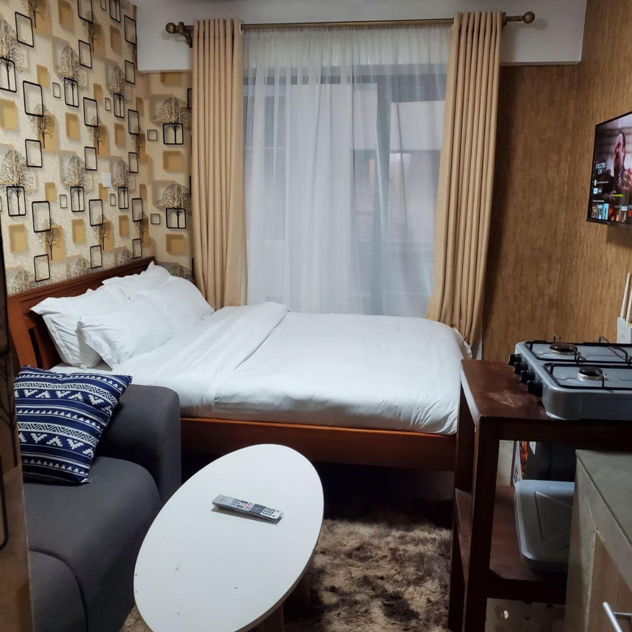 Lovely & Cozy Compact Studio Near Airport With Rooftop View Apartment Найроби Екстериор снимка