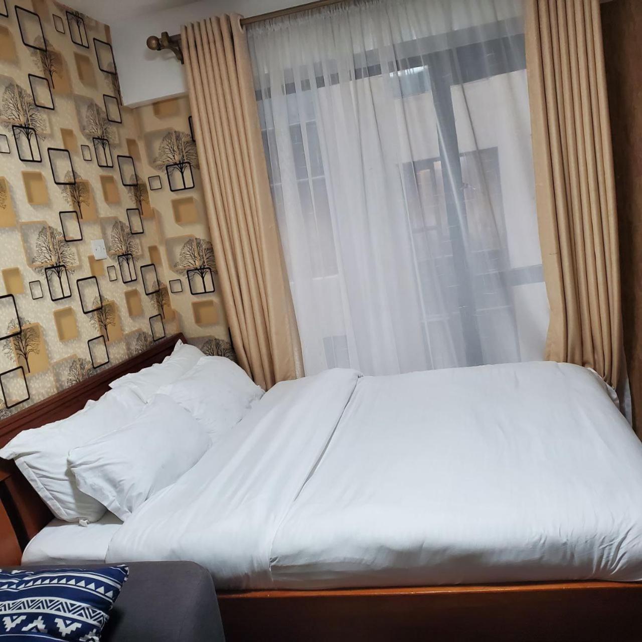 Lovely & Cozy Compact Studio Near Airport With Rooftop View Apartment Найроби Екстериор снимка