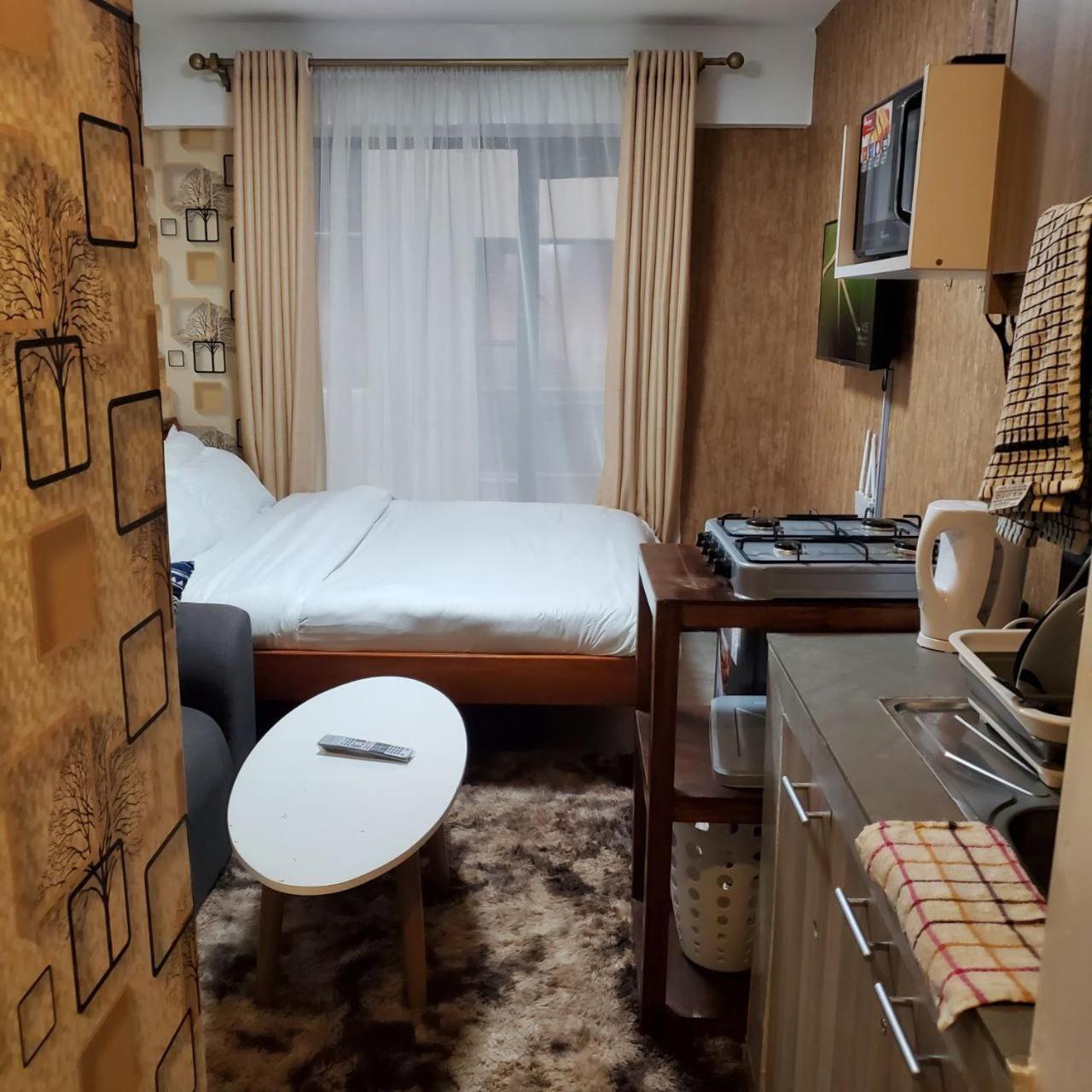 Lovely & Cozy Compact Studio Near Airport With Rooftop View Apartment Найроби Екстериор снимка